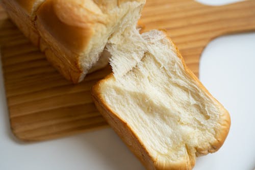 bezplatná Základová fotografie zdarma na téma chleba, detail, dřevěná deska Základová fotografie