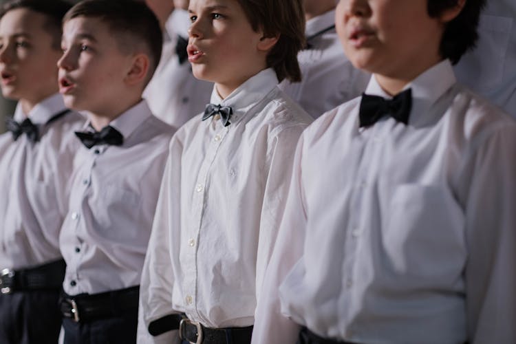 Boys In White Shirt And Black Bowtie