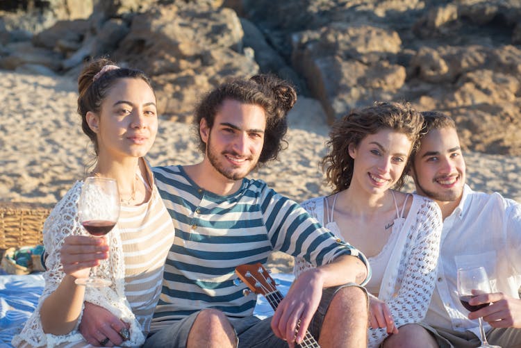 Couples Hanging Out At The Beach