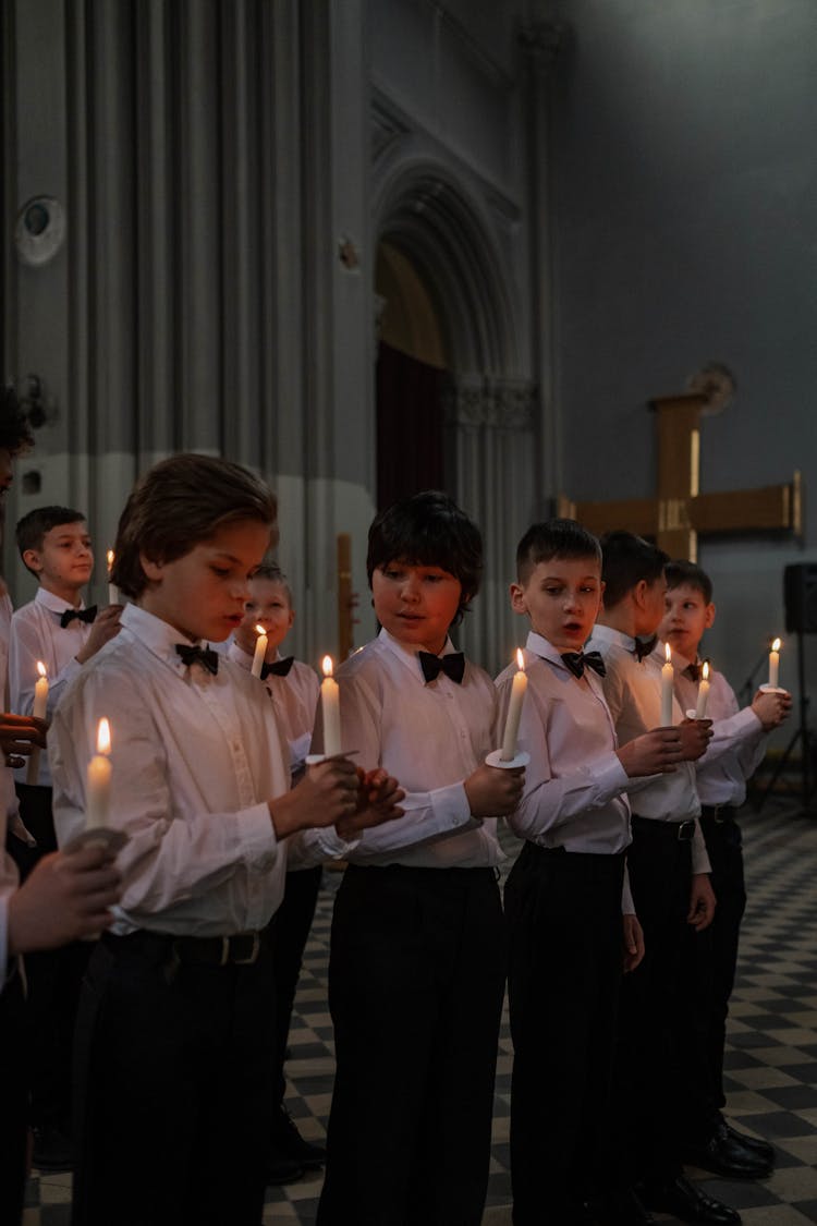 Boys Holding Candles