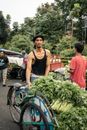 A Merchant with a Front Load Tricycle