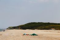 Assorted Stuff on Brown Sand Near Green Mountain