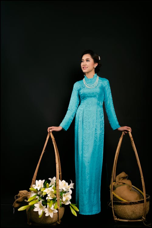 Woman in Elegant Blue Dress