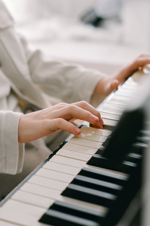 Free Fingers on Piano Keyboard Stock Photo