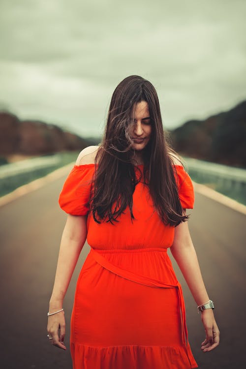 Woman in Red Off Shoulder Dress 