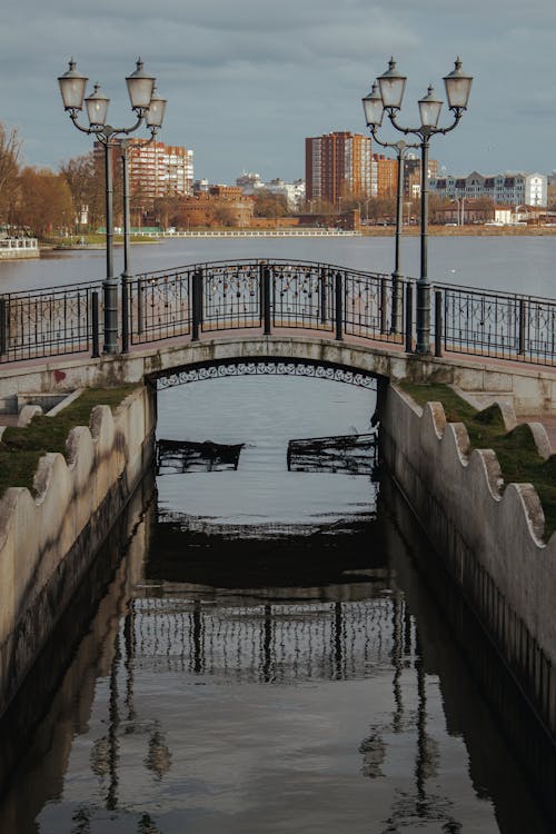 Concrete Bridge with Steel Railing Over River