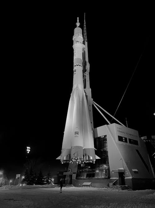 Grayscale Photo of a Rocket