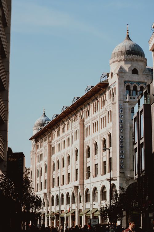 Free A beautiful capture of the Legacy Ottoman Hotel facade in Istanbul, showcasing its unique architectural style. Stock Photo