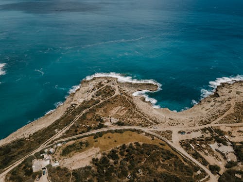 Drone Shot of a Field Near the Sea