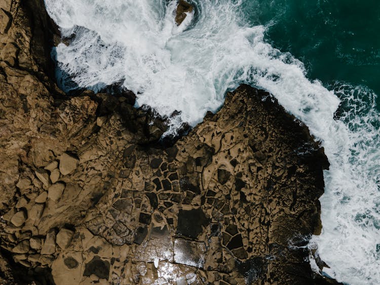 Waves Crashing On Rocky Shore 