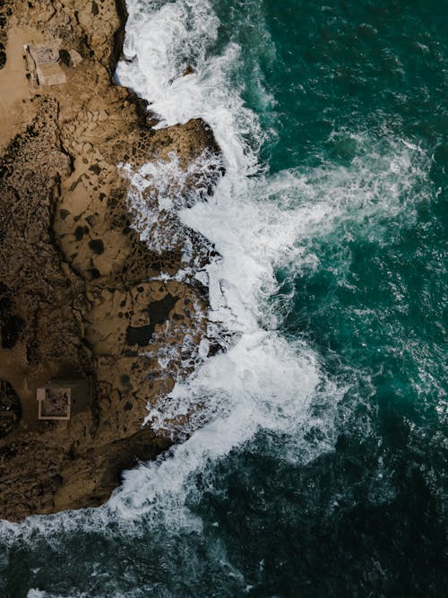 Drone Shot of Waves Crashing on the Shore