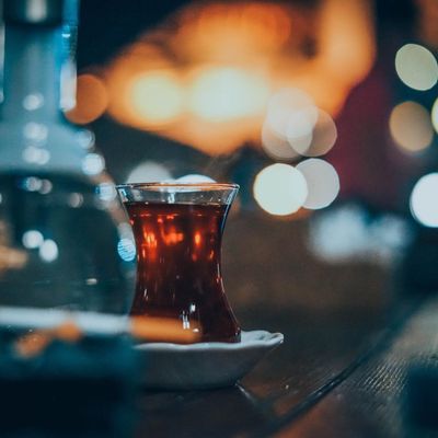 Glass of roasted tea with rising steam — photo by Fatih Sucu on Pexels