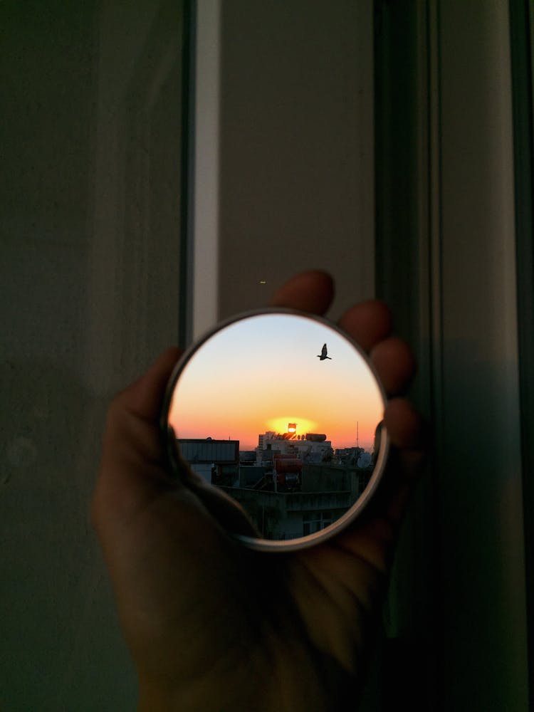 Sunset Reflection On Round Mirror