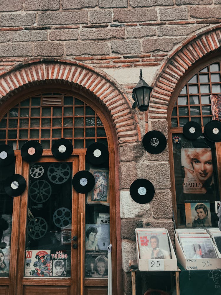 Close-up Of A Facade Of A Shop With Records And Magazines In City 