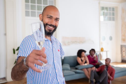 A Man Holding a Wine Glass