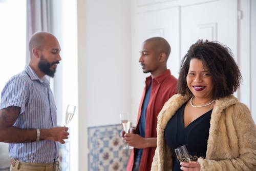 People Holding Glasses of Wine