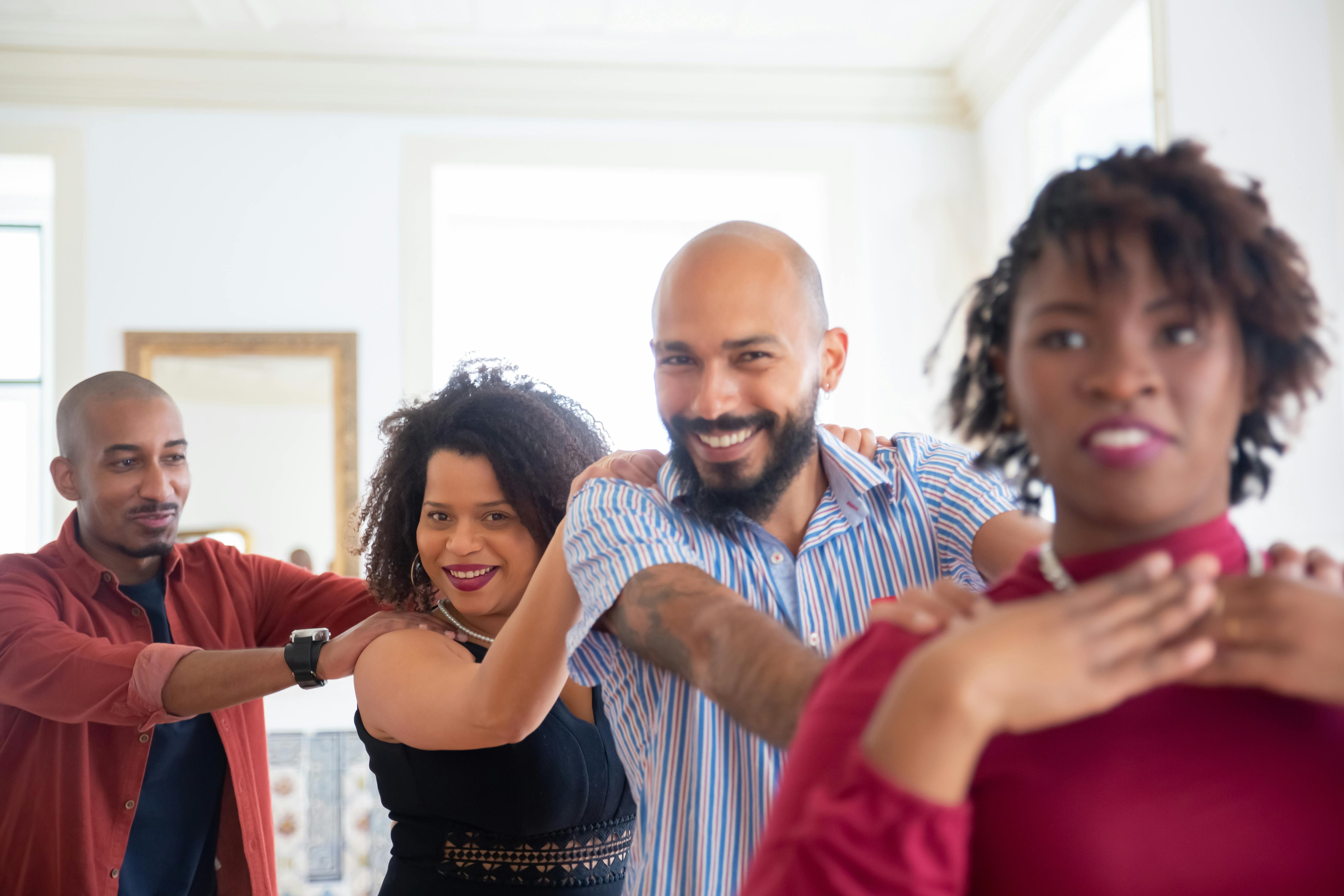 happy people doing a conga line