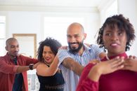 Happy People Doing a Conga Line