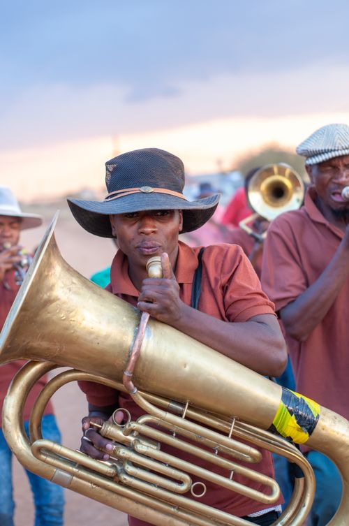 Free Dynamic street musicians perform with brass instruments in South Africa. Stock Photo