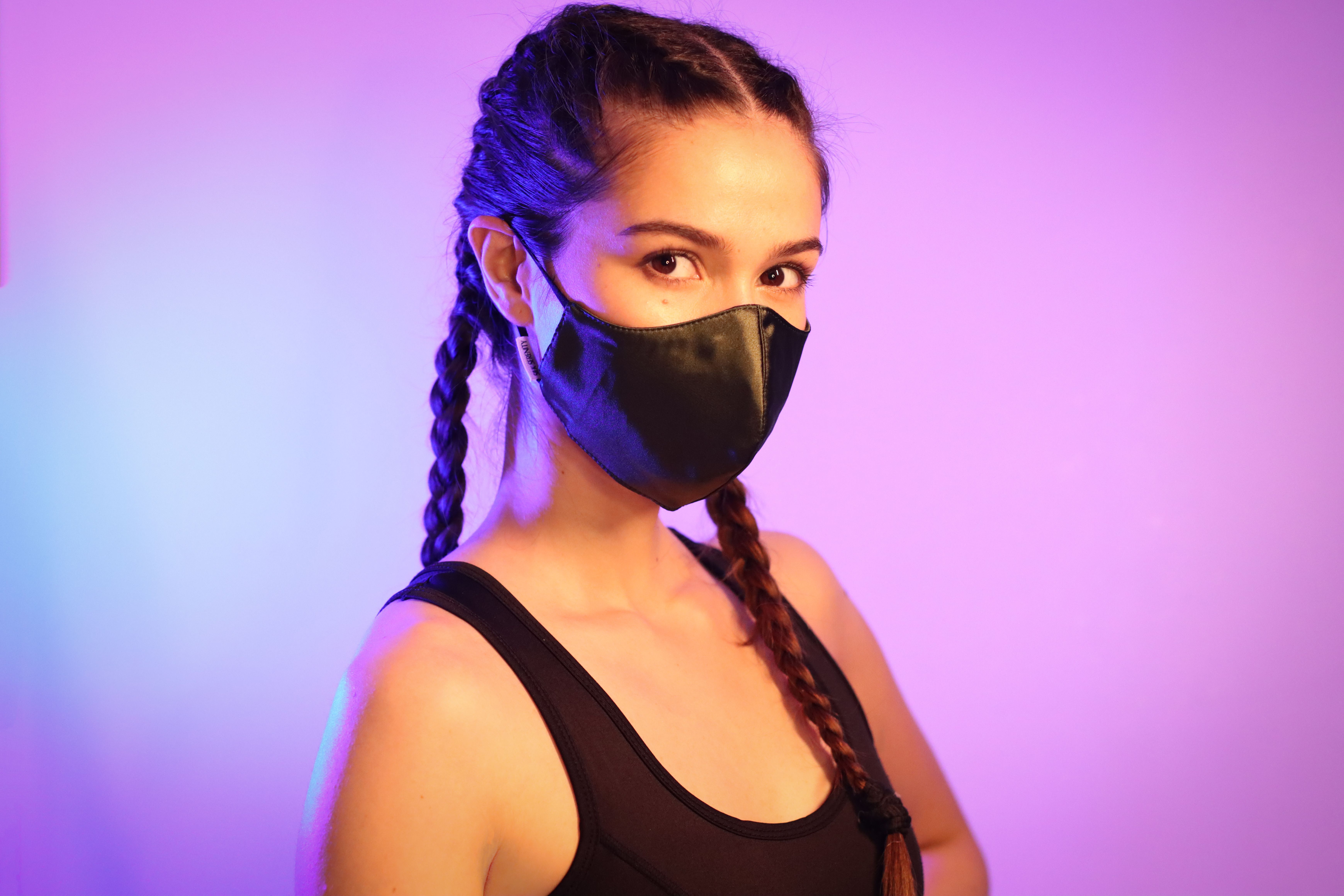 A Woman in Black Tank Top Wearing a Mask · Free Stock Photo