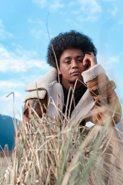 Man in Brown Jacket Posing