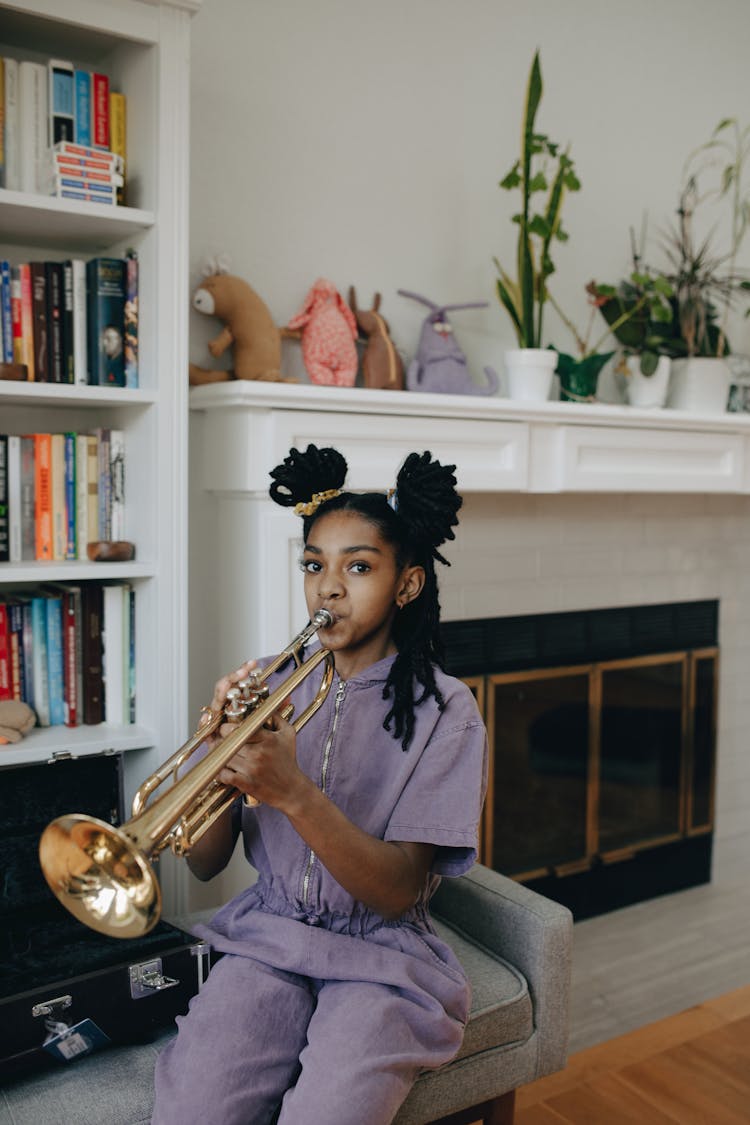 Girl In Purple Dress Playing Trumpet