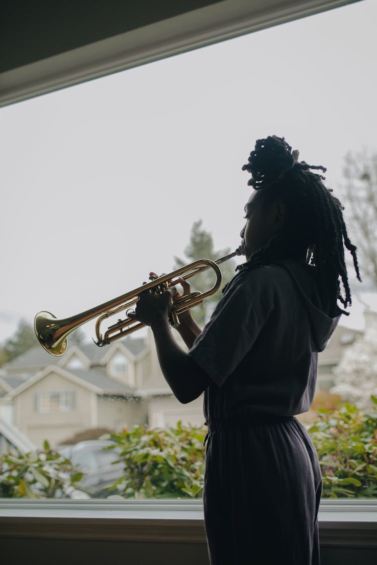 Woman Playing Trumpet