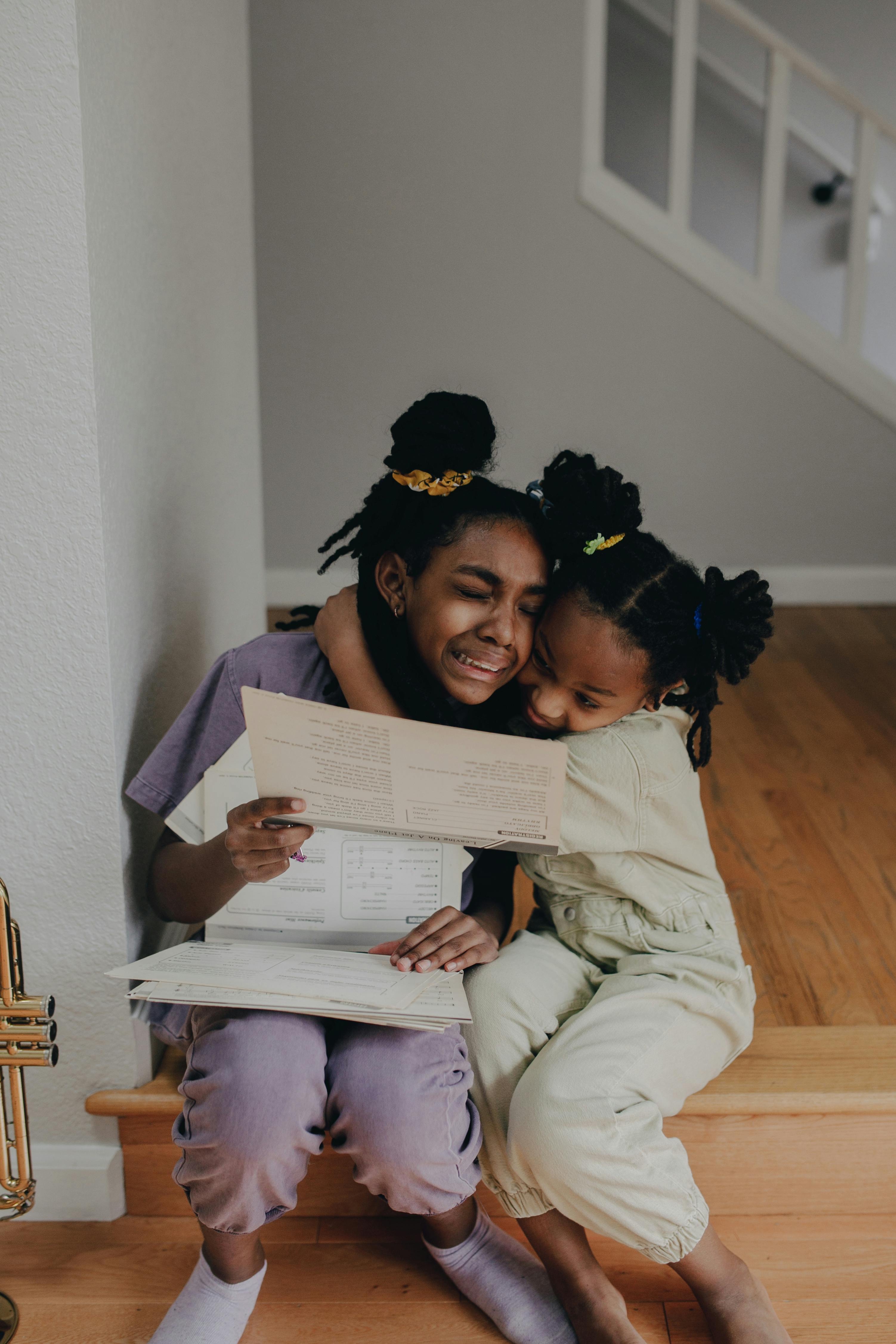 siblings hugging each other