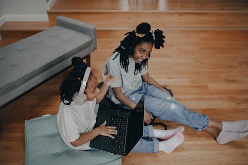 Free Kids Sitting on the Floor While Using Laptop Stock Photo