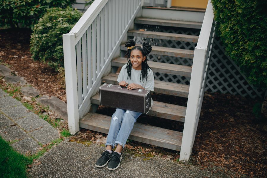 Young musician with instrument case