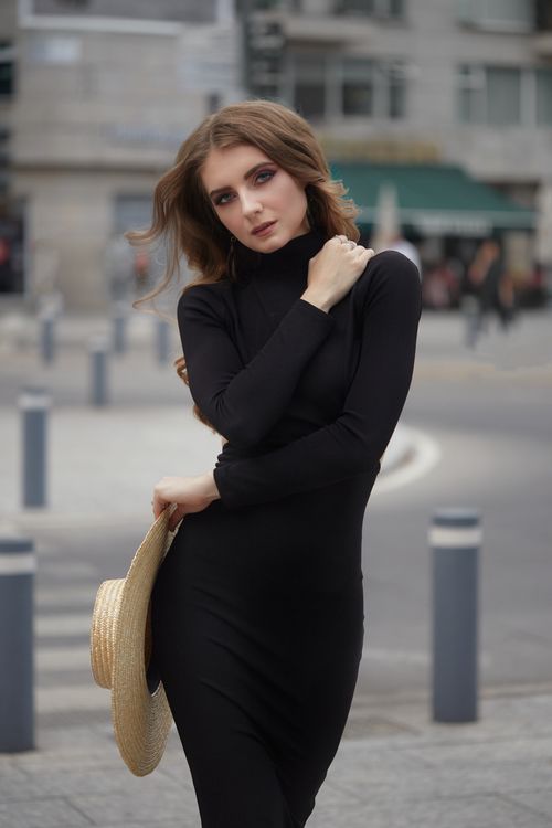 A Woman in Black Long Sleeve Dress  Free Stock Photo
