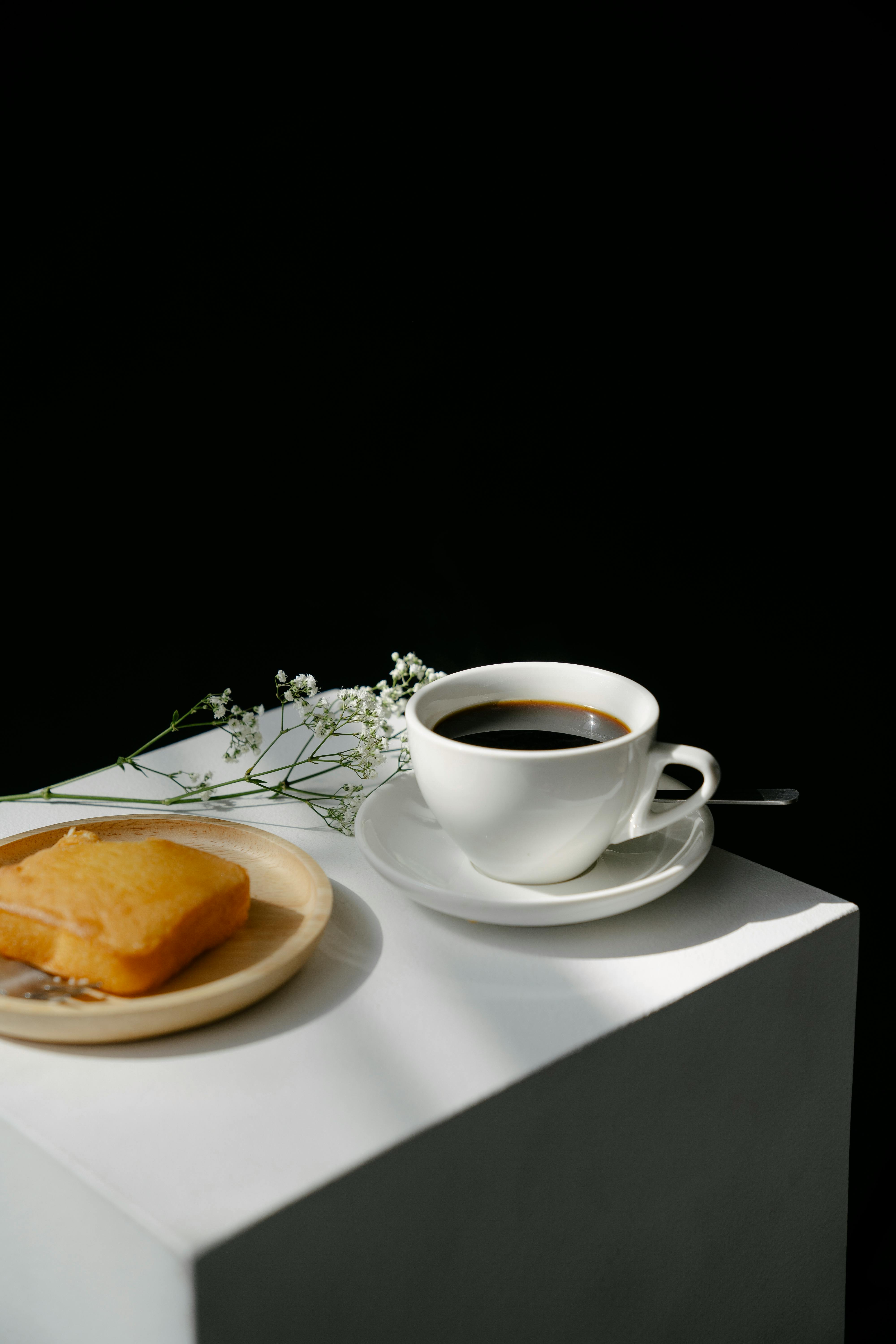 White ceramic cup on brown wooden tray photo – Free Coffee cup Image on  Unsplash