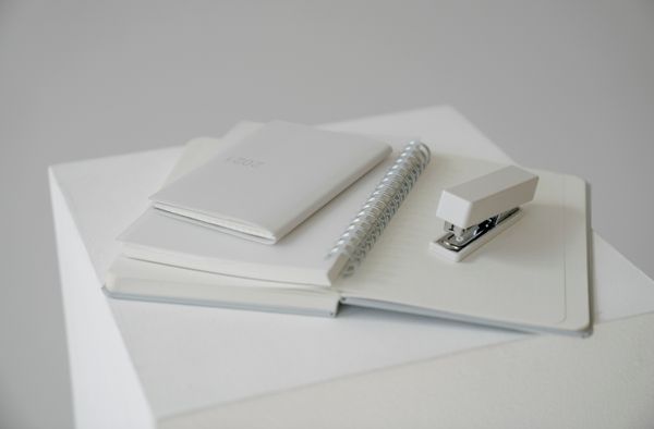 Notepad with stapler and diary planner
