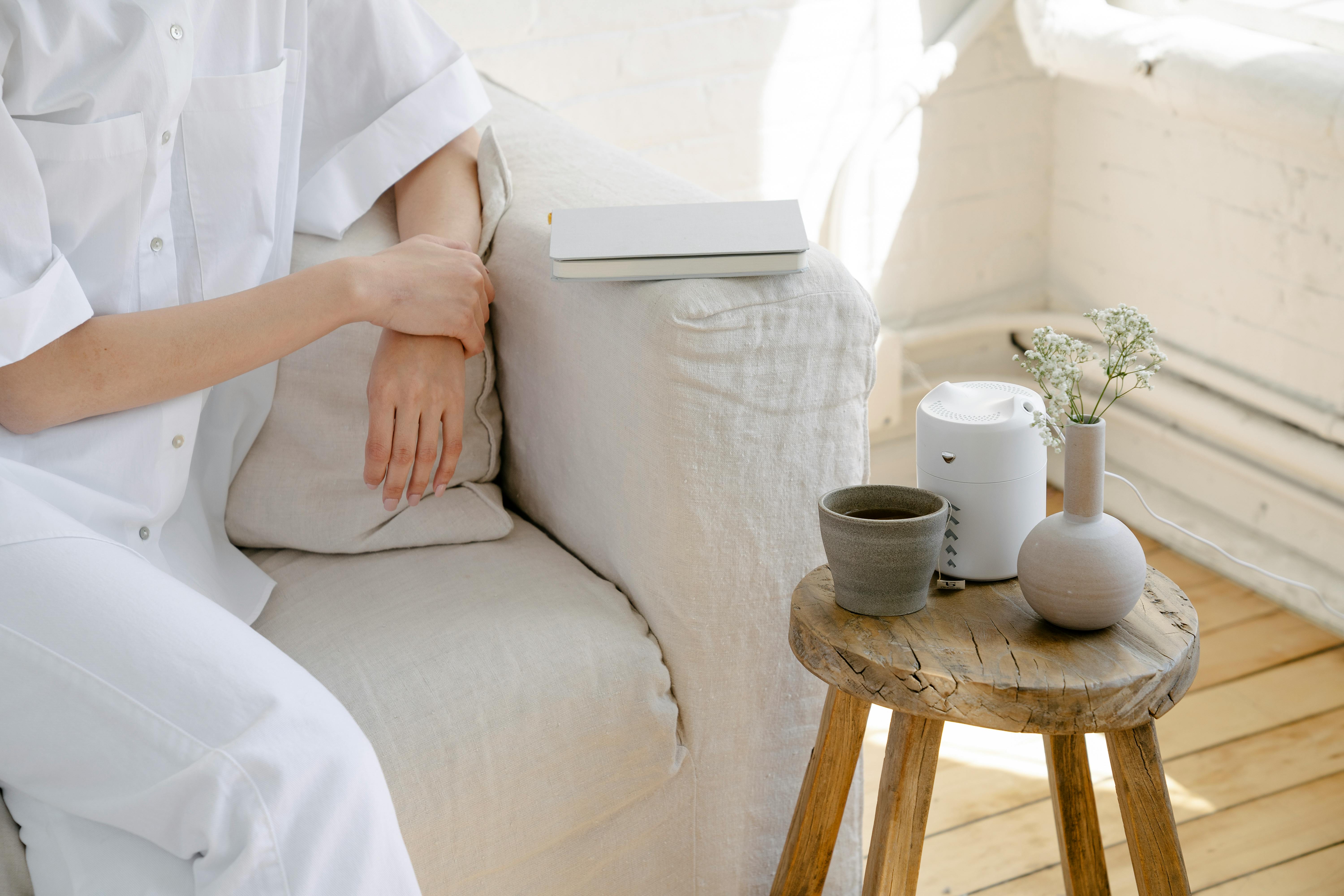 crop person resting in cozy room