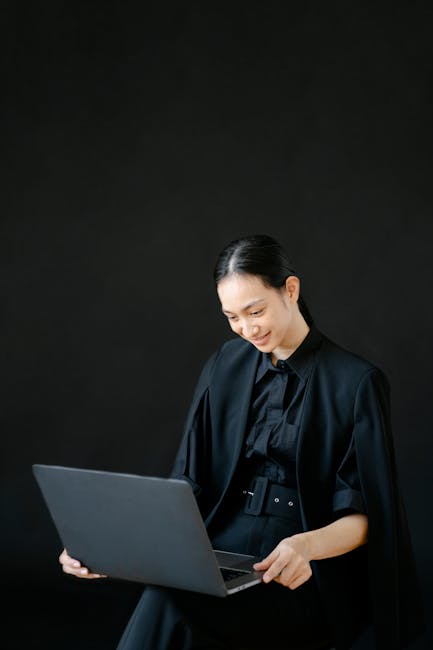 Elegant woman in black attire smiling