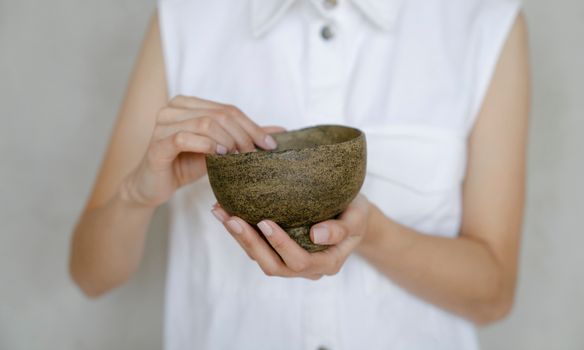 Person Holding Green Round Fruit