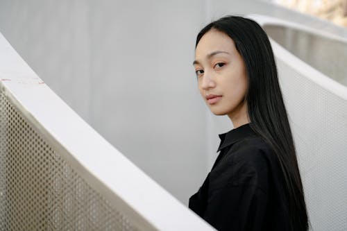 Free Portrait of a Woman in a Black Shirt Stock Photo