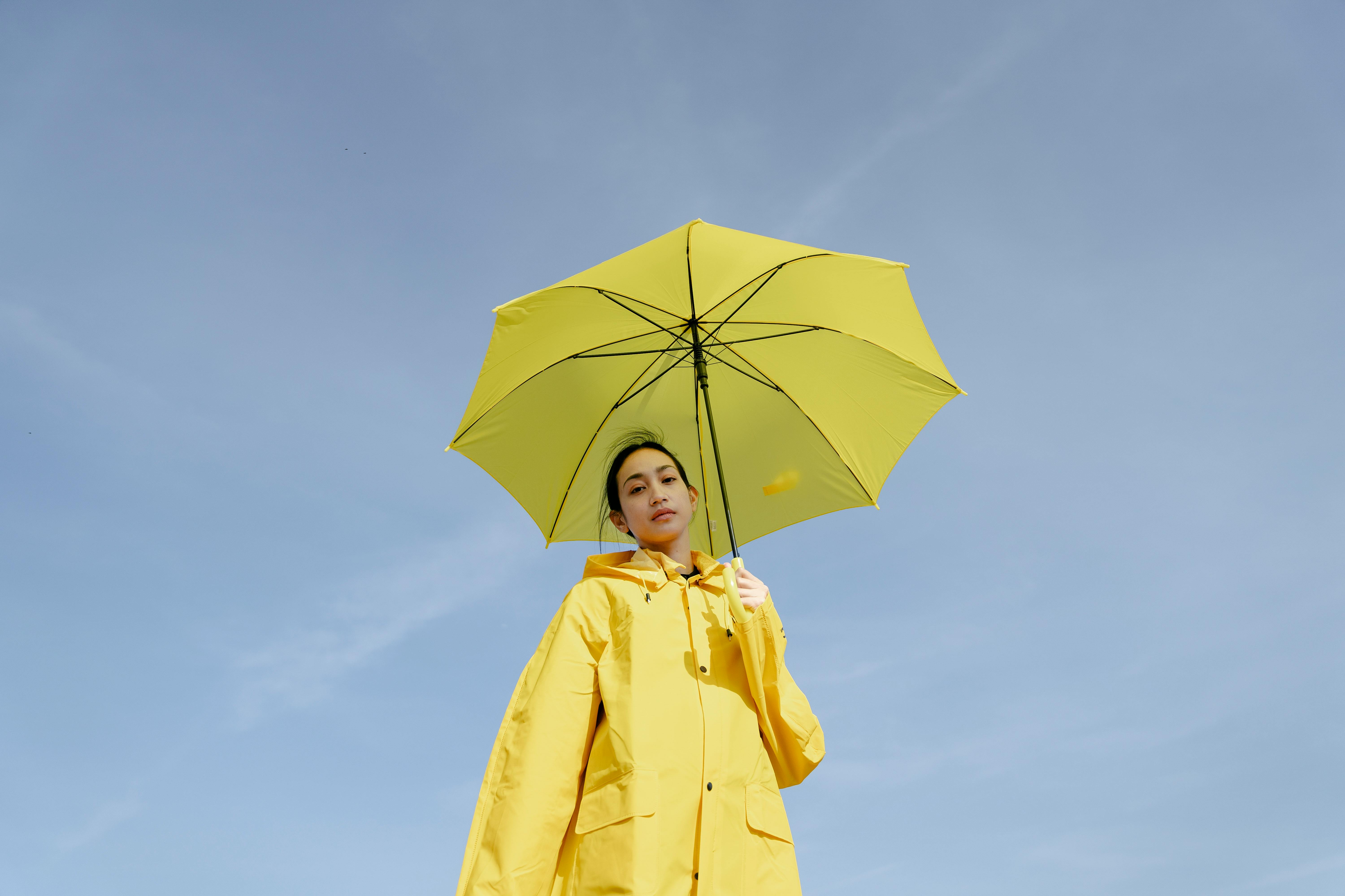 AI Fashion design of a woman blue space Raincoat