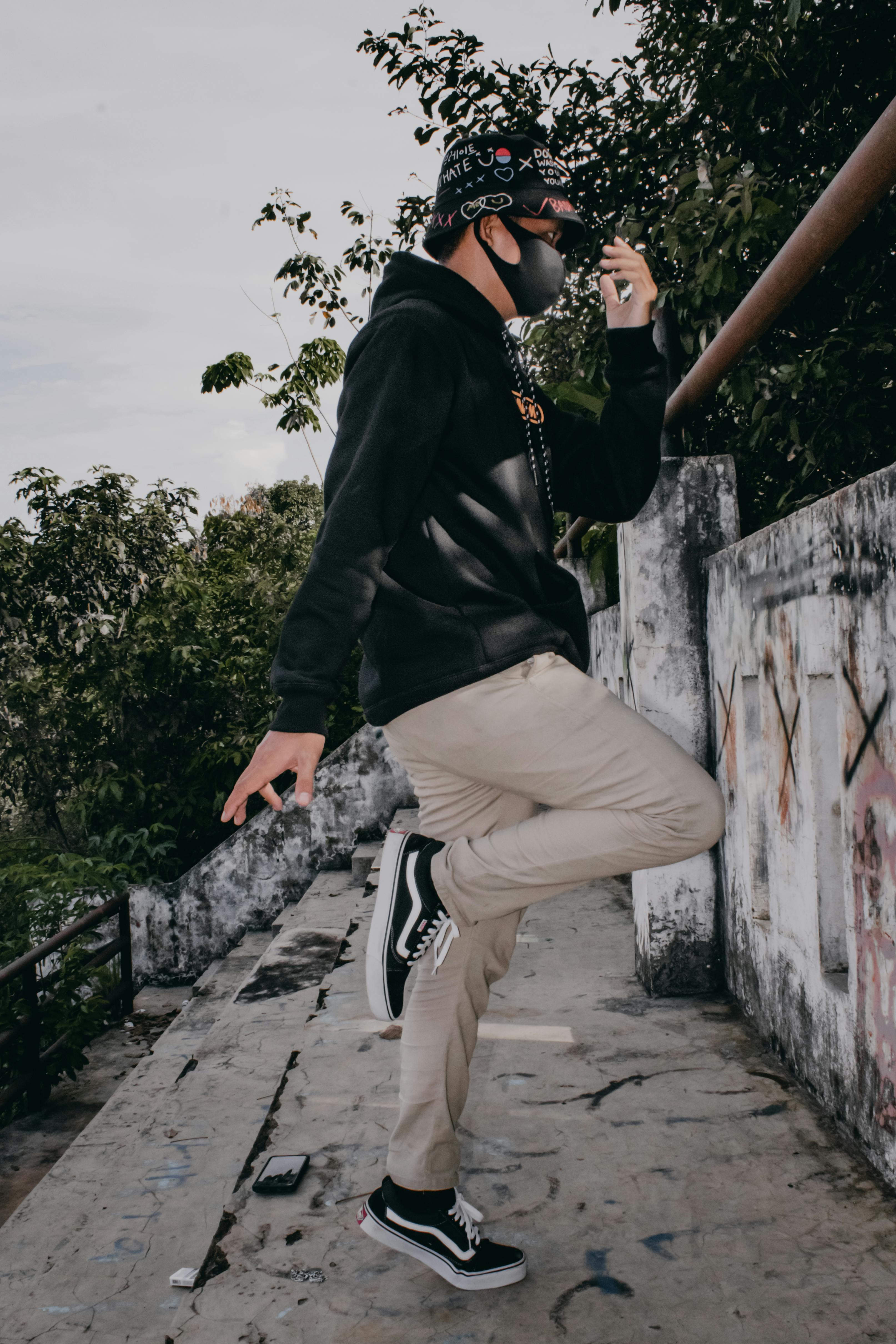Doctor holding a chart explaining vaccination benefits to an older adult