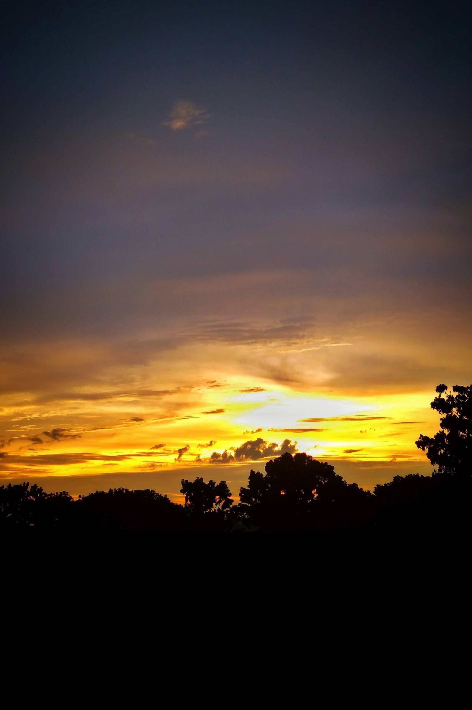 Sunset over the Texas horizon marking a family transition