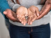 Person Holding a Key