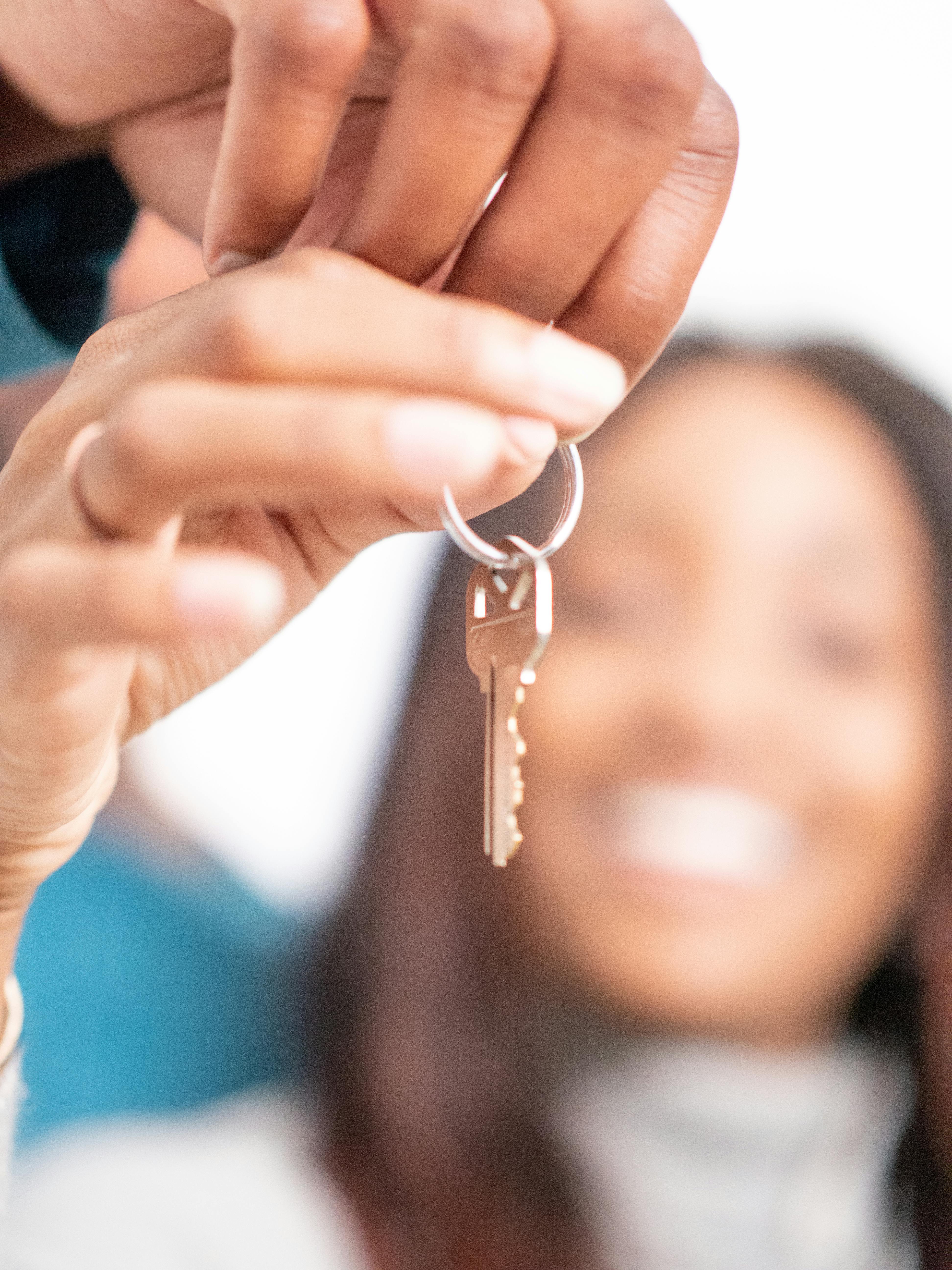 person holding a key