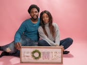 Man in Blue Long Sleeve Shirt Sitting Beside Woman in Gray Long Sleeve Shirt