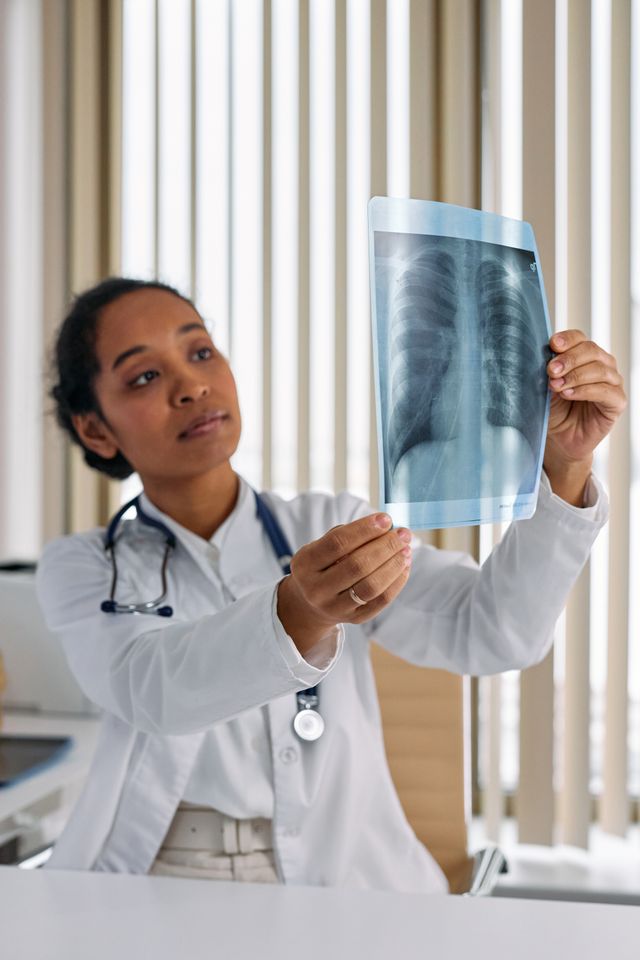 Doctor looking at an X-ray result in an orthopaedic clinic