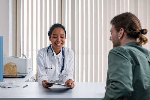 Free A Doctor Talking the Patient Stock Photo