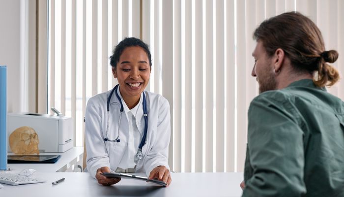 Health professional in a supportive coaching session
