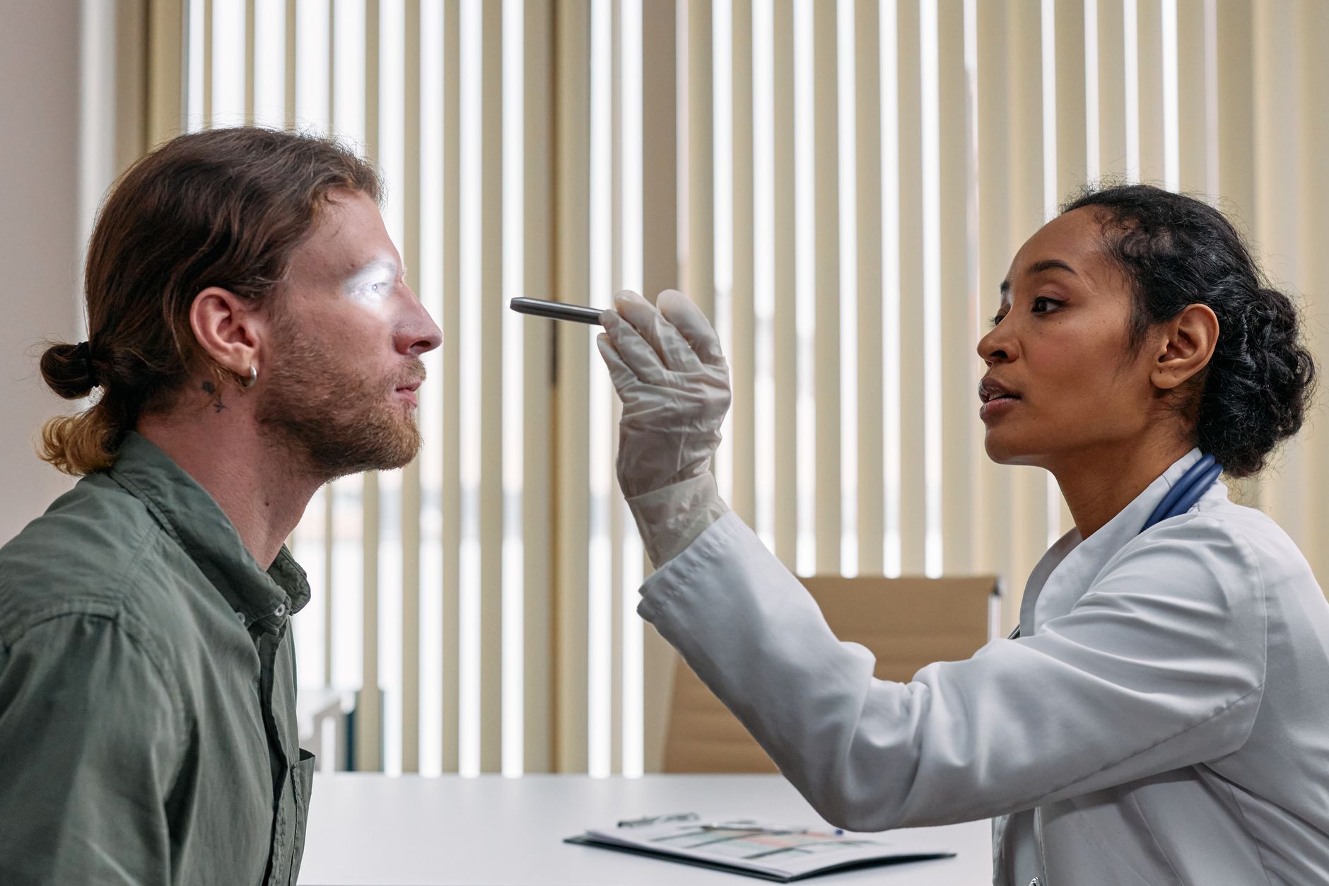 Veterinarian examining a pet during a checkup