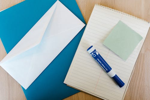 Free Marker on Top of a Notepad Stock Photo