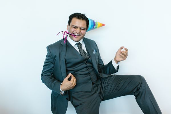 Joyful man celebrating with a party hat — RDNE Stock project on Pexels