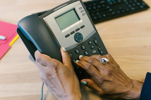 Free Person Holding a Telephone Stock Photo